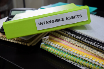 Folders with the label Intangible assets. Business management concept