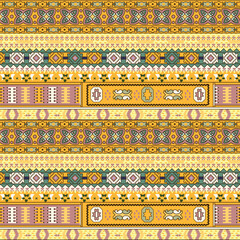 a yellow and green ethnic pattern with a tribal design