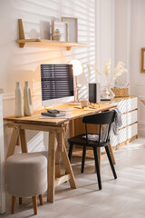 Comfortable workplace with computer in home office