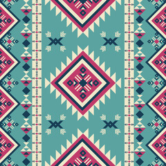 Turquoise and pink Navajo-inspired vertical geometric seamless pattern with tribal diamond motifs. Perfect for ethnic textiles, apparel prints, and modern bohemian decor.