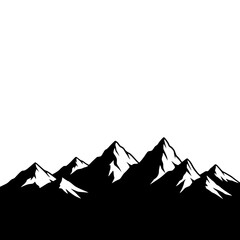 Majestic Snow Capped Mountain Range Peaks Against a White Sky