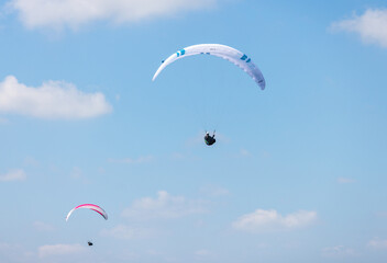 Paragliding action player in Harting Down, West Sussex Petersfield, United Kingdom