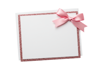A transparent greeting card with rounded corners, a soft pink satin ribbon bow on the top right, and fine pink glitter peeking from the bottom and left on a transparent studio background with copy