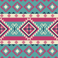Colorful seamless tribal geometric pattern in turquoise, cream, and pink with diamond shapes. Ideal for southwest style fabrics, upholstery, bohemian wallpaper, and folk art projects.
