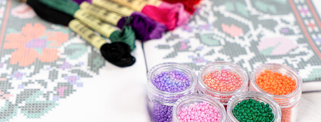 Set for beading. Beads in packages. Threads in the palette