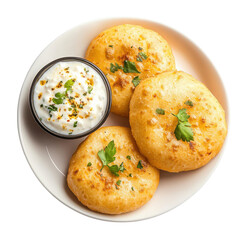 Fototapeta premium Delicious Indian Aloo Tikki Served with Mint Yogurt Dip on a White Plate on transparent background