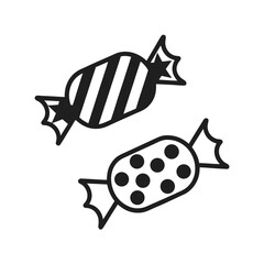 Two wrapped candies with patterns candy sweet