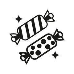 Two wrapped candies with sparkling accents candy sweets