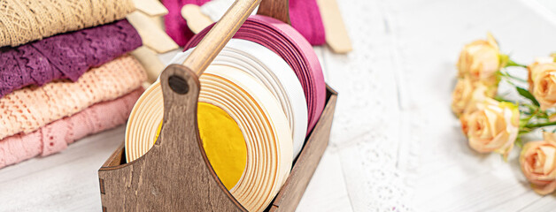 Colored ribbons and lace in coils for hobbies