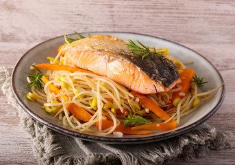 Bean sprouts with carrot and salmon fillet
