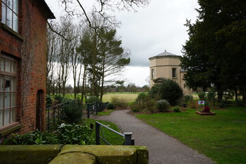 Shugborough, Staffordshire, England - February 24 2024: Historic octagonal pavilion and garden path...