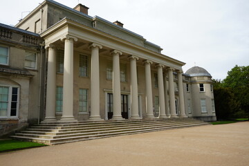 Shugborough, Staffordshire, England - February 24 2024: Neoclassical mansion facade with grand...