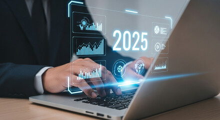 Business analysis and data analytics forecast for year 2025 with financial charts and graphs on laptop