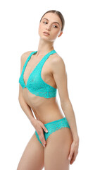 Woman wearing beautiful underwear on white background