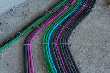 Electrical wiring in corrugated plastic pipes. Pipes are part of electrical installation works for...