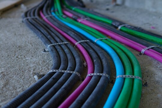Electrical wiring in corrugated plastic pipes. Pipes are part of electrical installation works for the infrastructure of buildings, engineering systems and processes of the construction industry.