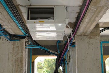 Electrical wiring in corrugated plastic pipes. Pipes are part of electrical installation works for...