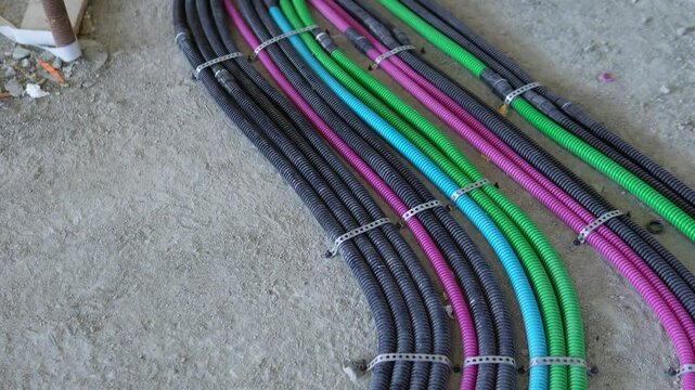 Electrical wiring in corrugated plastic pipes. Pipes are part of electrical installation works for the infrastructure of buildings, engineering systems and processes of the construction industry.