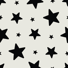 Seamless pattern of black stars on a light gray background