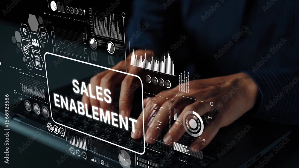 Poster hands typing on laptop with digital sales enablement concept and data graphics overlay in modern off