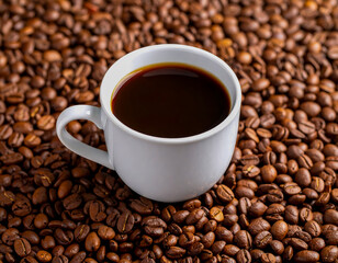 Fototapeta premium Coffee cup surrounded by beans showing rich textures