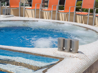 Resort Jacuzzi with Orange Chairs