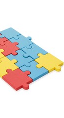 Several different colored puzzle pieces fitting together perfectly on a clean white background. A powerful metaphor for teamwork, solutions, and business strategy.