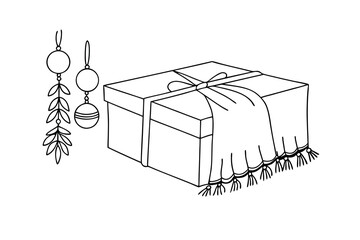 Gift box with decorative ornaments and tassels present