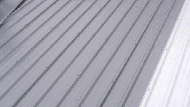 Architectural metal sheet with PU foam insulation for durable roof panel. gray industrial form creates modern and minimalist abstract background with strong pattern