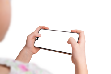 Close-up of a smartphone in a young girl's hands, held horizontally while interacting with a game or app. Isolated display and transparent background, perfect for mockup