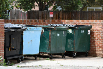 Dumpsters outside medical clinic.