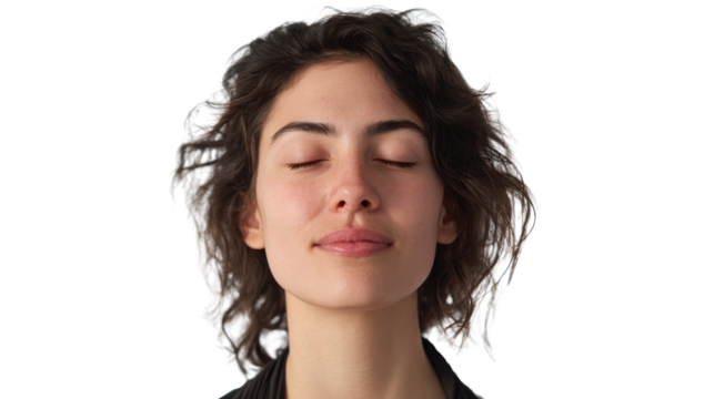 Woman with closed eyes, relaxed expression, enjoying a moment of peace and tranquility.