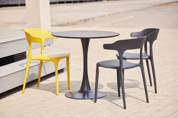Tables and chairs on the street, cafe in the park