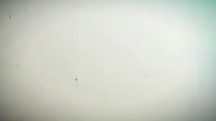 Subtle film damage overlay with authentic texture and light artifacts for retro aesthetics