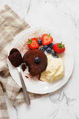 Chocolate Fondant with Vanilla Ice Cream and Strawberries