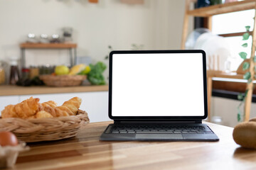Tablet on counter with morning snacks