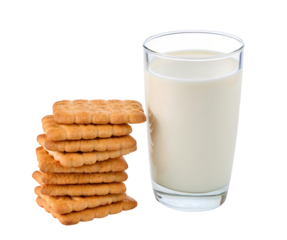 Stacked golden biscuits beside a full glass of creamy milk isolated on pure white background