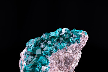 Dioptase. Specimen from Tsumeb Mine, Namibia. macro photography detail texture background. close-up mineral crystal unpolished semi-precious gemstone