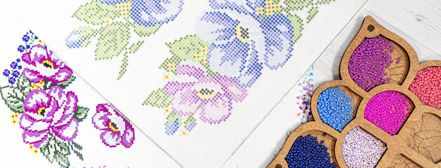 Set for beading. Beads in packages. Threads in the palette
