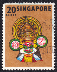 Traditional mask of Singaporean actors on a 1968 Singapore postage stamp. Traditional Dances and Musical Instruments Series.