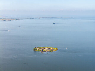 Naklejka premium Aerial photo of Fort Island Pampus in IJmeer Lake near Amsterdam, the Netherlands