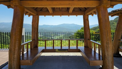 Korean traditional style pavilion and mountain scenery