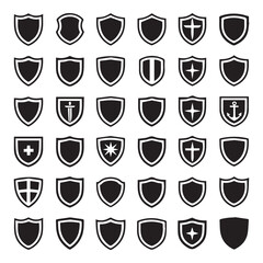 Collection of black shield icons with various designs and symbols on a white background