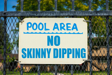 No skinny dipping pool sign