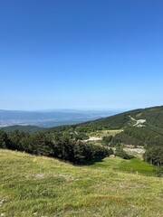  Mountain Hillside with Forest and Distant Valley View