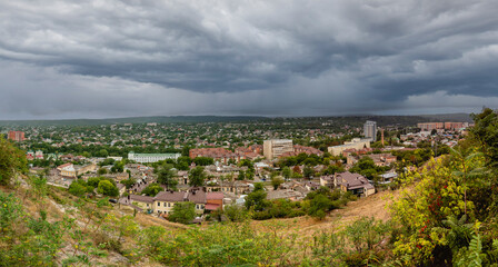 View from the observation deck of Pyatigorsk on cloudy autumn day. Clouds over the city
