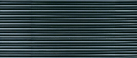 Texture. Building wall or closed blinds on a window. Metal horizontal flats