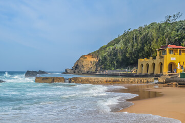 Thompsons bay beach, Picturesque sandy beach in a sheltered cove with a tidal pool in Shaka's Rock,...