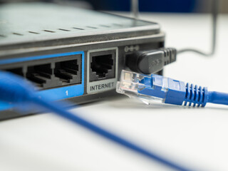 The internet cable is pulled out of the router. 