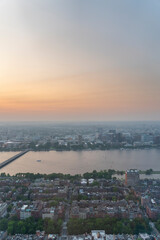 Boston cityscape at sunset with river and buildings